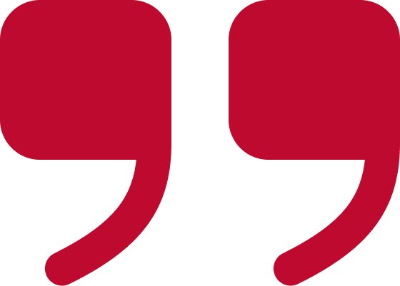 Red quotation marks on black background.